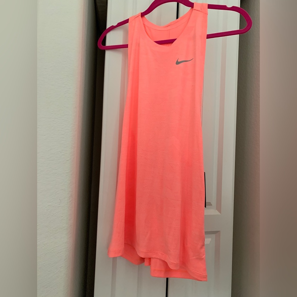 Nike melon split open back tank top with dri fit technology